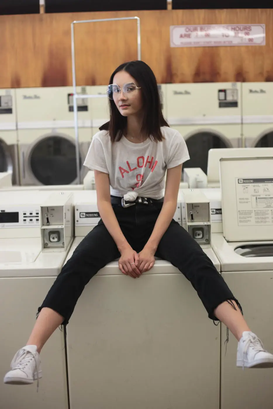 Portrait woman laundromat